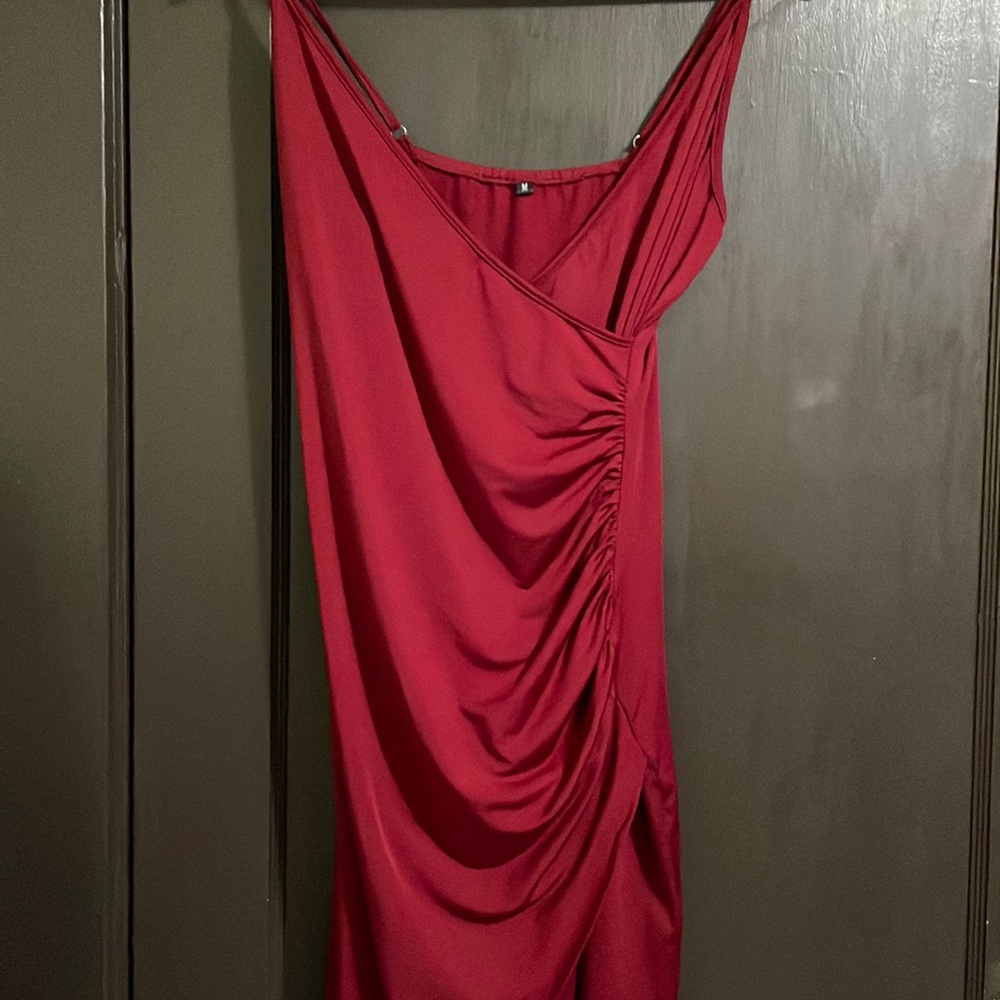 Red body tight dress with slit